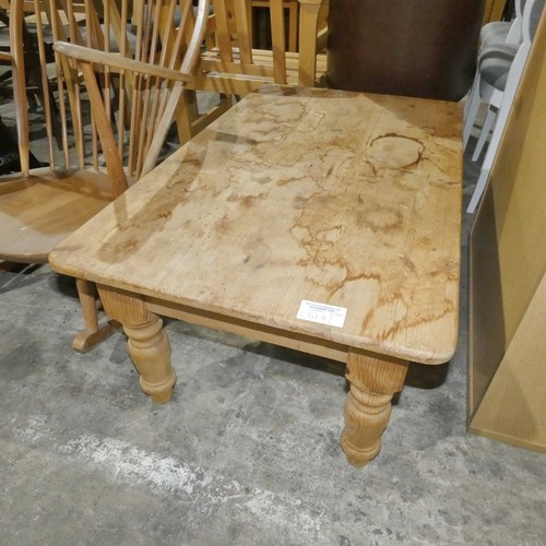 2761A - 1 x Pine coffee table approx 64 x 104cm - top has some water stain marks