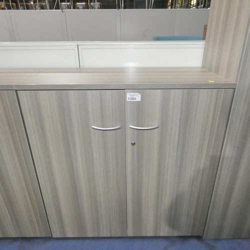 1384 - 1 x grey wood effect two door cabinet approx 99 x 47 x 105cm high