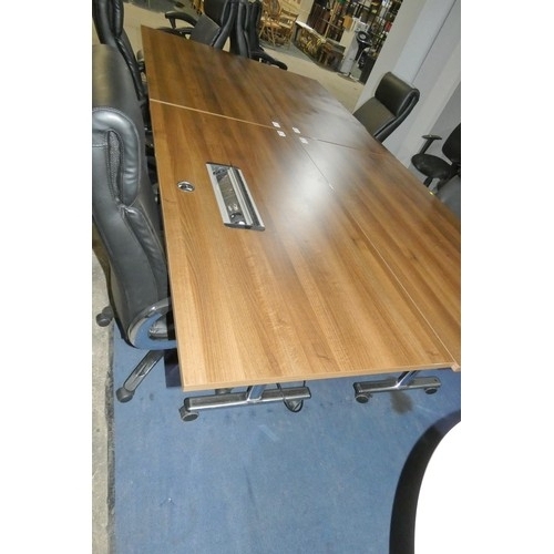 1400 - 1 x rectangular dark wood effect tipping top table on wheels approx 160 x 80cm with a cable manageme... 