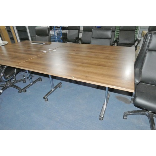 1402 - 1 x rectangular dark wood effect tipping top table on wheels approx 160 x 80cm