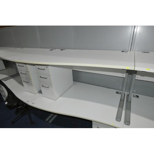 1435 - 1 x white piano / wave front office table approx 140 x 100cm supplied with a white under work top pe... 