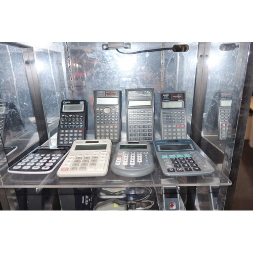 2516 - A quantity of various scientific and other calculators, cameras and Dictaphones - trade