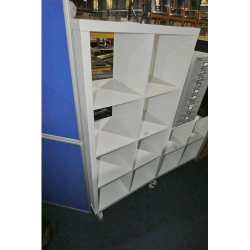 1483 - 1 x white cube shelving unit approx 77 x 39 x 147cm high - has wheels fitted