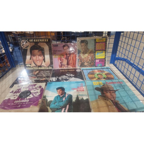 2323 - A quantity of various Elvis Presley vinyl records including 7 inch singles and long play albums in m... 