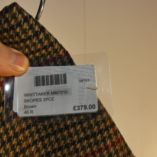 58 - A gentleman's Whittaker suit by Skopes, jacket 46R & trousers 40R, includes waistcoat, retail price ... 