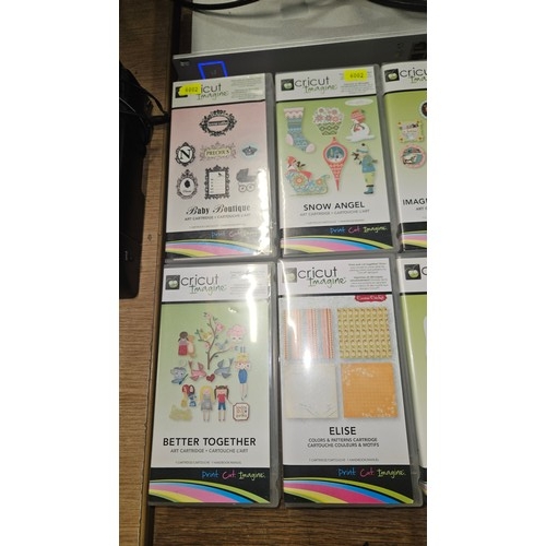 2503 - 13 various Cricut imagine art cartridges