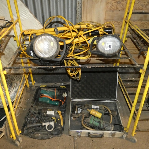 5012 - A quantity of various items including work lights, a McKeller drill 240v, a Hitachi angle grinder 11... 