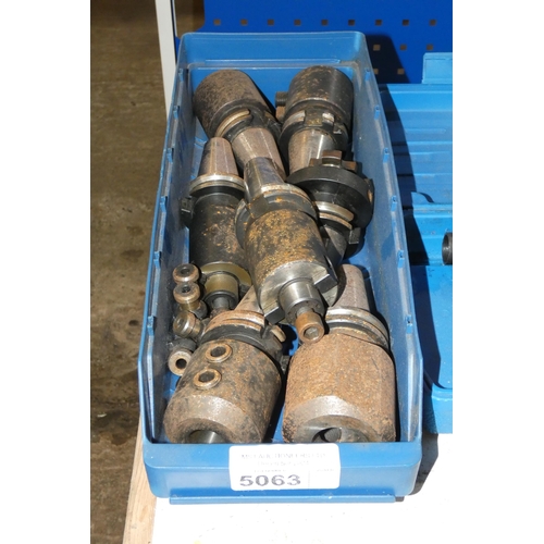 5063 - A box containing a quantity of CAT40 tool holders