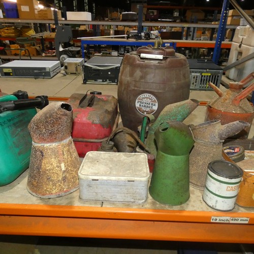 5137 - A quantity of various items including a jerry can, fuel cans, oil cans and vintage tins