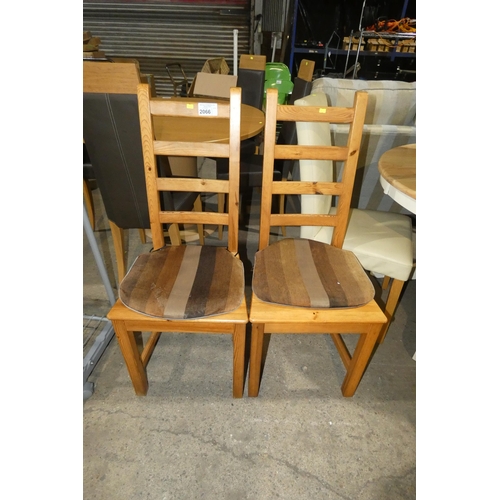 2066 - 2 x Pine ladder back dining chairs