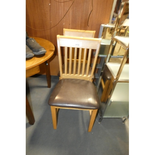 2152 - 2 x wooden dining chairs with brown upholstered seat pads