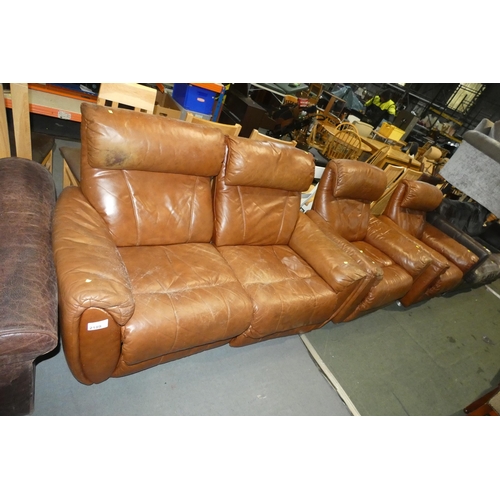 2189 - A brown upholstered two part sofa approx 165cm wide and 2 x matching arm chairs (probably part leath... 