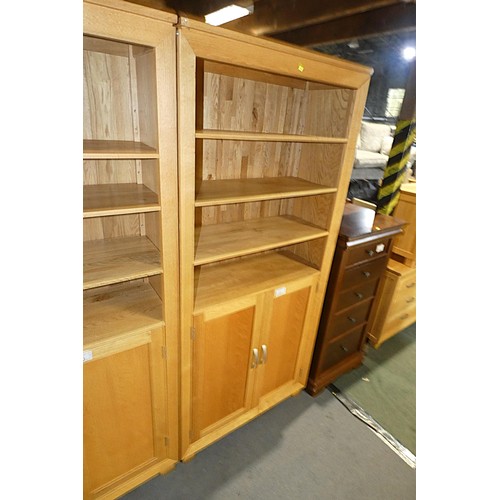 2161 - A light Oak cabinet with 3 shelves above and 2 doors below approx 90 x 38 x 196cm high