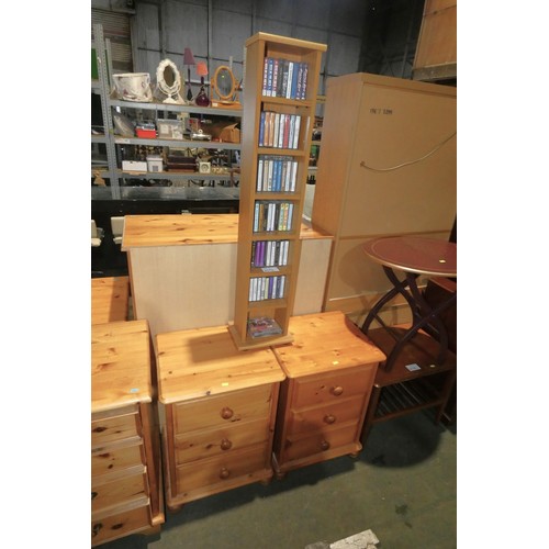 2175 - 2 x Pine 3 drawer bedside cabinets and 1 x wood effect audio tape rack containing a quantity of vari... 