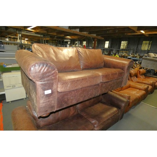 2187 - A brown upholstered sofa approx 205cm wide (probably leather upholstered)