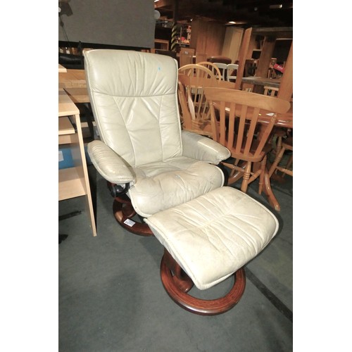 2227 - A Stressless light grey upholstered reclining swivelling lounge chair with a matching foot stool