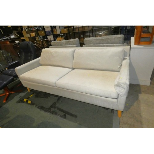 2235 - A light coloured upholstered sofa approx 204cm wide - legs require attention