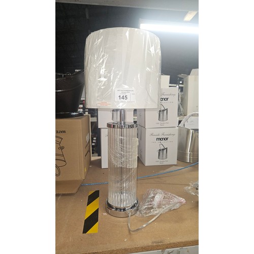 145 - 1 x clear glass table lamp with shade approx 64cm high