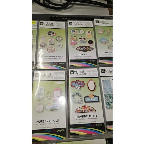 2509 - 13 various Cricut imagine art cartridges