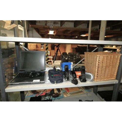 2431 - A quantity of various electronic related items including cordless phones by Panasonic, old laptop, S... 