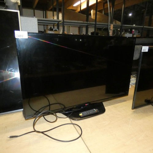 2492 - A 42 inch flat screen TV by LG type 42LN540V with stand and remote control - trade