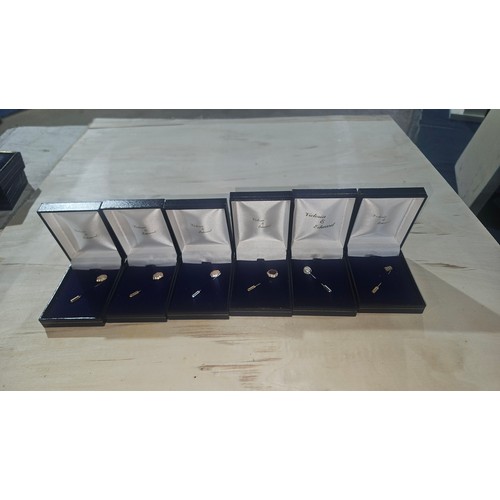 638 - 24 x various cravat pins in presentation boxes, avg price £10 each