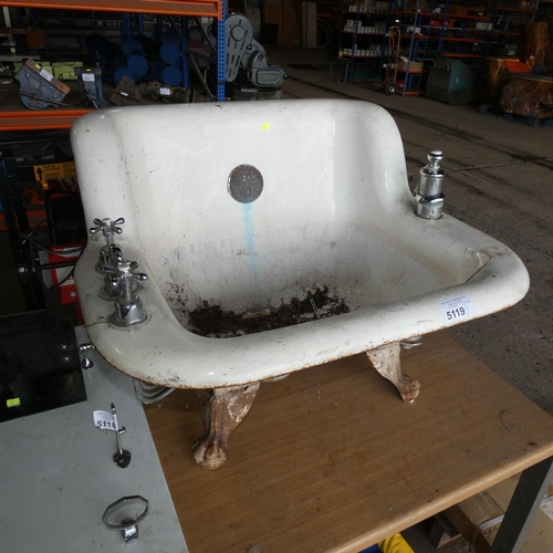 5119 - An antique cast iron sitz bath / shower chair with taps and claw feet fitted approx 80cm wide x 56cm... 