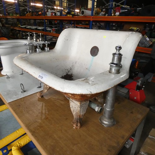 5119 - An antique cast iron sitz bath / shower chair with taps and claw feet fitted approx 80cm wide x 56cm... 