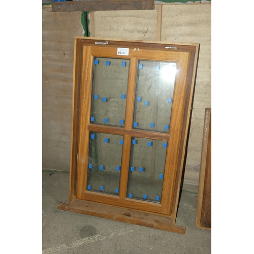 5979 - 1 x Iroko window with frame and fitted with 4 x small panes of double glazed glass, overall approx 6... 