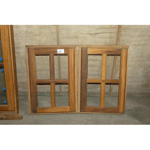 5980 - A pair of Iroko windows with frames (no glass fitted or included) overall each approx 49.5cm w x 70c... 