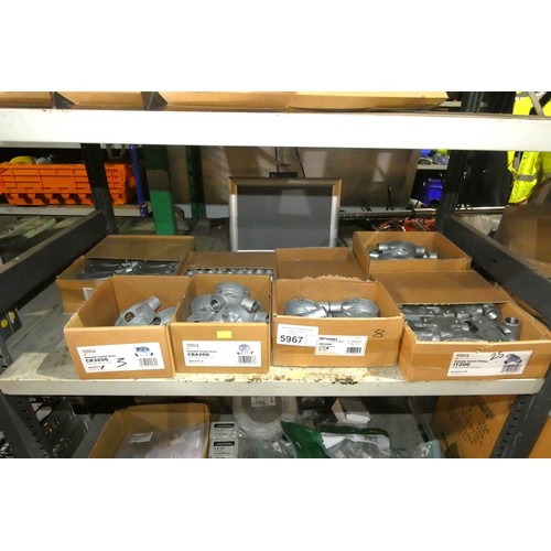 5967 - A quantity of metal malleable conduit boxes and fittings. Contents of 1 shelf