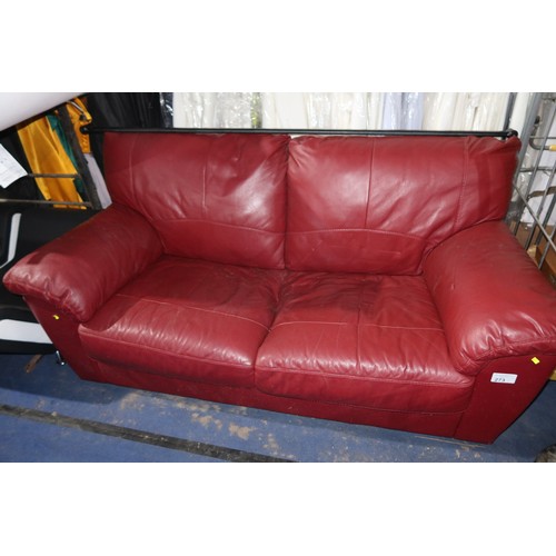 273 - 1 x burgundy upholstered sofa approx 183cm wide. Please note that this sofa is used