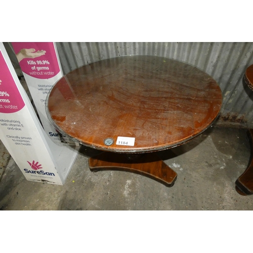 1184 - A round wooden central pedestal restaurant table approx 90cm