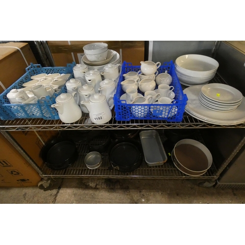 1192 - A quantity of various catering related items including white crockery cake tins etc, contents of 2 s... 