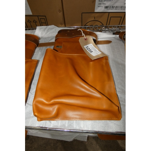 1258 - A leather, waist half apron by Pier Point with a pouch