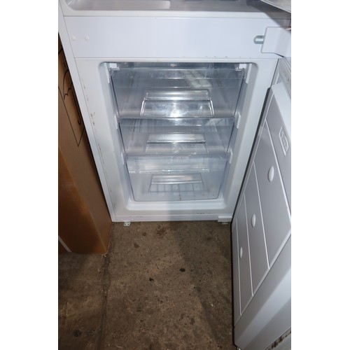 1243 - A tall integrated fridge freezer by CDA type FW872/3 - trade