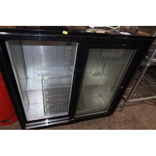 1293 - A counter height 2 door bottle display fridge approx 90x52x90cm - tested working - trade