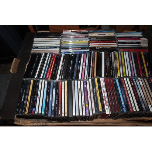 A large quantity of various audio CDs in 2 boxes