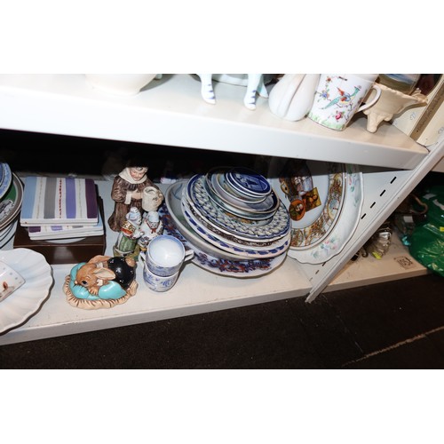3038 - A quantity of miscellaneous decorative chinaware and ornaments etc (three shelves)