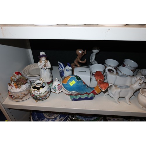3038 - A quantity of miscellaneous decorative chinaware and ornaments etc (three shelves)