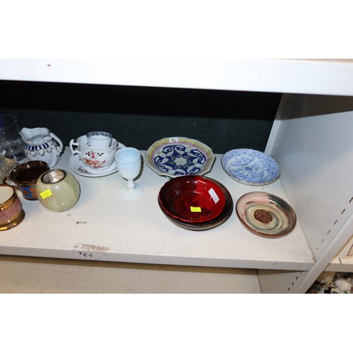 3040 - A quantity of miscellaneous decorative chinaware, glassware and ornaments etc (four shelves)