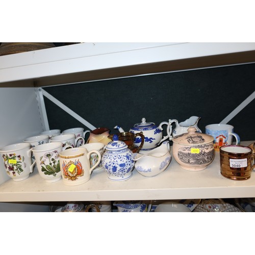 3040 - A quantity of miscellaneous decorative chinaware, glassware and ornaments etc (four shelves)