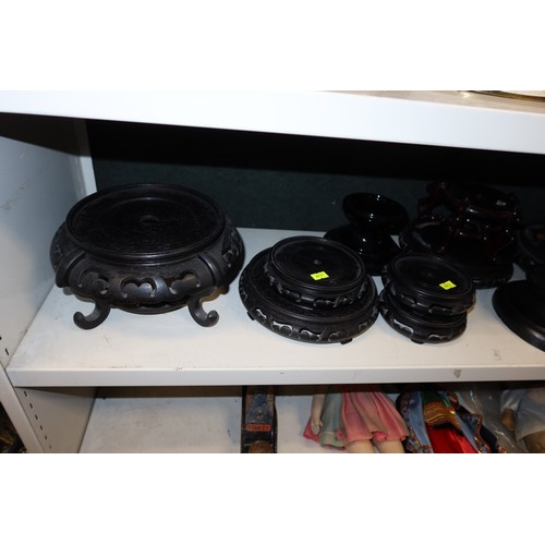 3051 - A collection of miscellaneous carved hardwood oriental and other stands (one shelf)