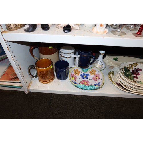 3057 - A quantity of miscellaneous decorative tea ware, glassware, ornaments and trinkets etc (three shelve... 