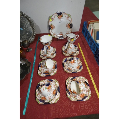 A multi-coloured Rose patterned tea set