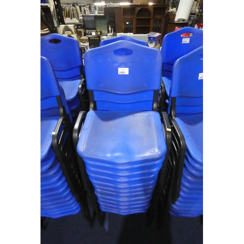 24 x blue plastic stacking chairs with black metal legs (2 stacks)