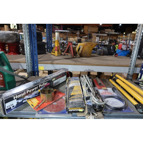 A quantity of various tools including a Maypole hand power puller, an ...