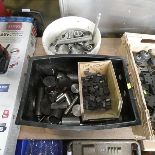 5111 - 2 tubs containing a quantity of various engineering metal off cuts