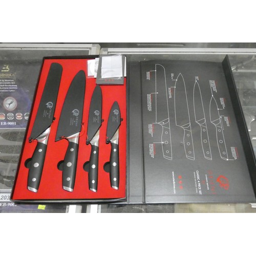 2037 - A classic 4 piece chef knife set by Orient type Carbon Series