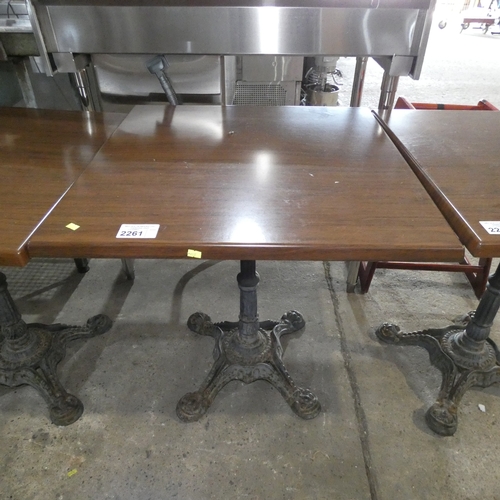 2261 - A square wood effect pub / Cafe type table with decorative cast iron base approx 70*70*77cm
